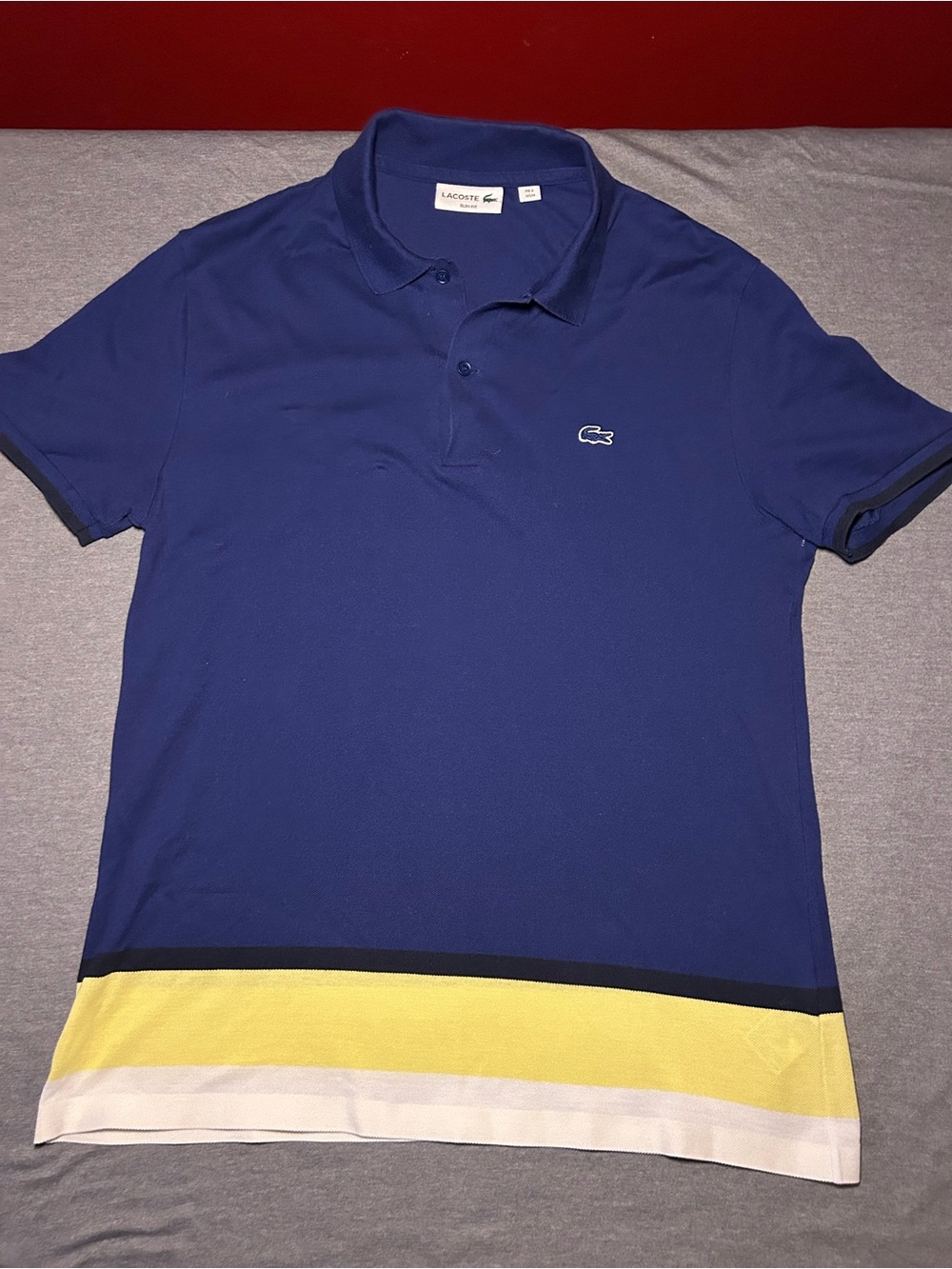 Lacoste Men's Colorblock Navy Polo with Yellow & White Hem Stripes